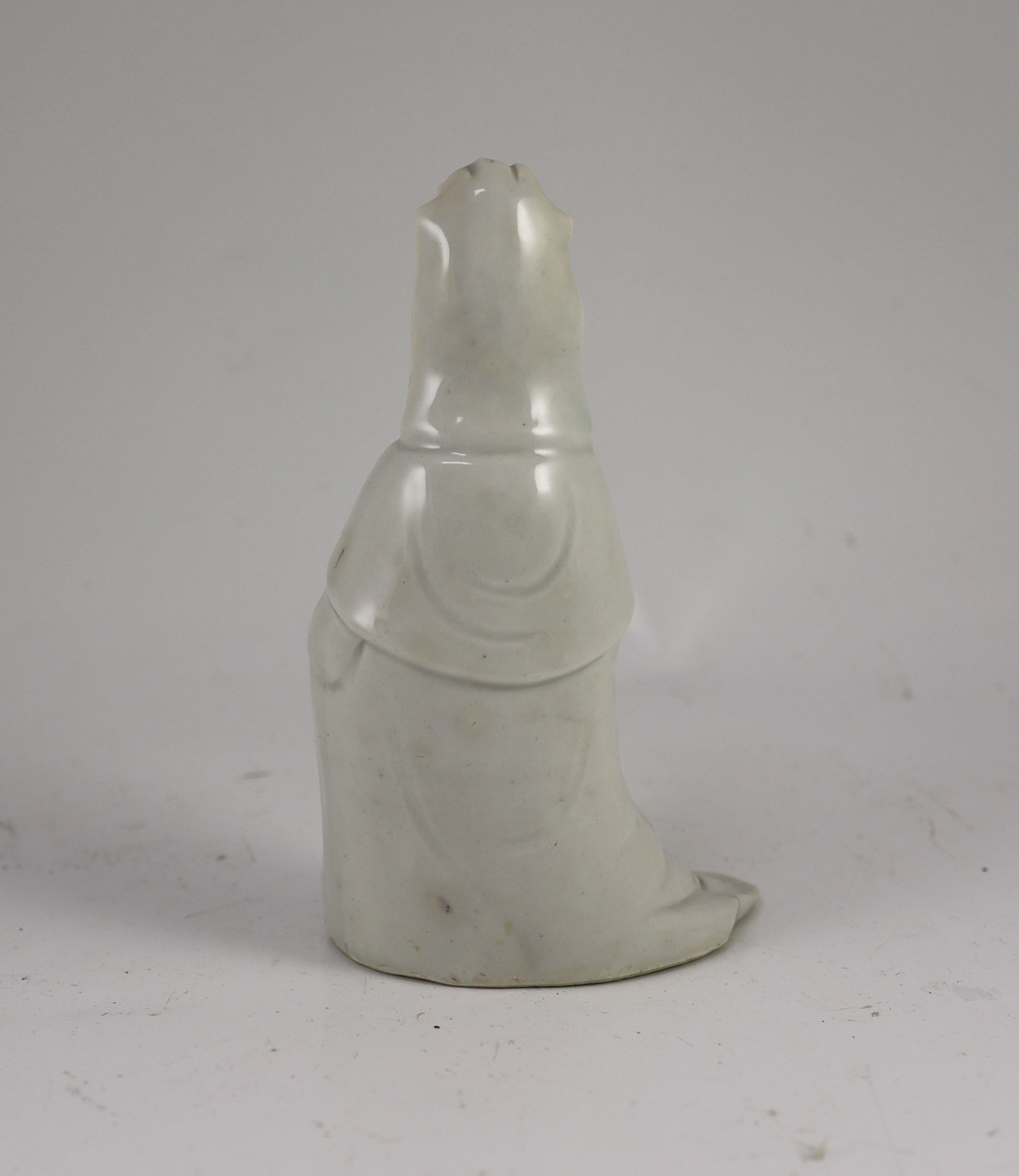 A Chinese blanc-de-chine seated figure of Guanyin, Dehua kilns, 18th century, 19cm high, losses to hand